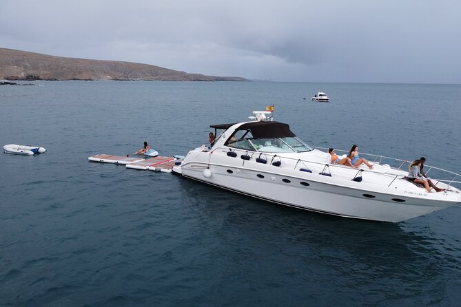 4 Hour Boat Tour with Snorkeling from Puerto Rico and Mogan - Playa Taurito, a beach viewed from the sea