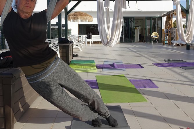 Aerial Yoga Experience in Maspalomas, Spain - Mats, hammocks, and water are already included