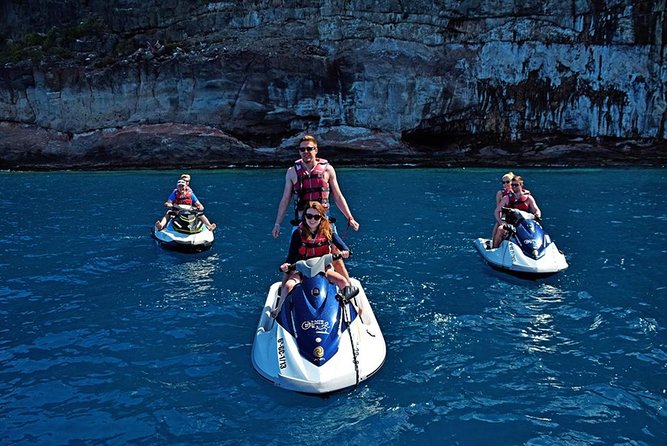 Experience the Thrill of Jet Skiing in Anfi del Mar - Riding the jet ski around Anfi Beach