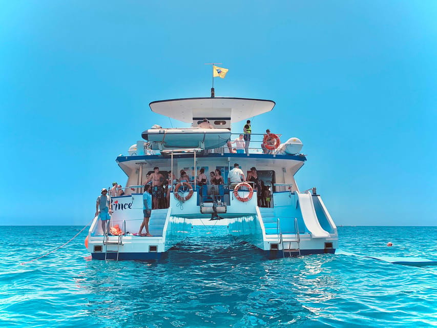 From Puerto Rico: Boat trip along the coast w/ Food & Drinks - Cruising the south coast toward Mogán