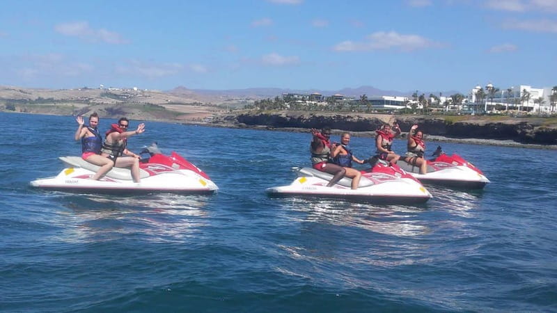 MASPALOMAS: JETSKI 30 MINUTES <em>FREE PICK UP – What the one-hour Maspalomas jetski outing actually includes’ /></p>
<p><p>This is a short, energetic water activity rather than a full coastal cruise. The full booking lasts about <strong>one hour</strong>, but the actual jetski riding time is advertised as 30 minutes. The remaining time covers transfer, getting fitted with a life jacket, instructions, and preparing the machines.</p>
</p>
<p><p>That distinction matters. If you are picturing a long afternoon on the water, this is not it. If you want a compact burst of speed between beach time and dinner, the format makes more sense.</p>
</p>
<p><p>You ride near the south coast of Gran Canaria, with views toward the Maspalomas Dunes. The appeal is not a long list of sightseeing stops. It is the feeling of controlling your own craft while the coast opens around you.</p>
</p>
<p><p>I would treat the activity as <strong>a short coastal ride with views</strong>, not as a guaranteed wildlife trip, island tour, or extended jetski safari. The advertised details focus on the Dunes, open-water riding, and panoramic coastal scenery.</p>
</p>
<h2 id="from-hotel-pickup-to-the-beach-launch">From hotel pickup to the beach launch</h2>
<p><img width="800" height="600" decoding="async" src=