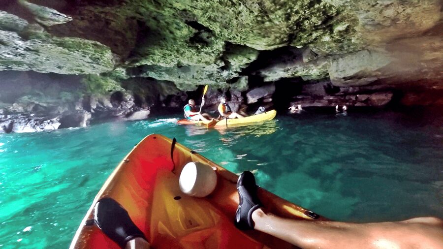 Mogán: Guided Kayak to Caves and Snorkeling Tour - Inside the volcanic sea caves